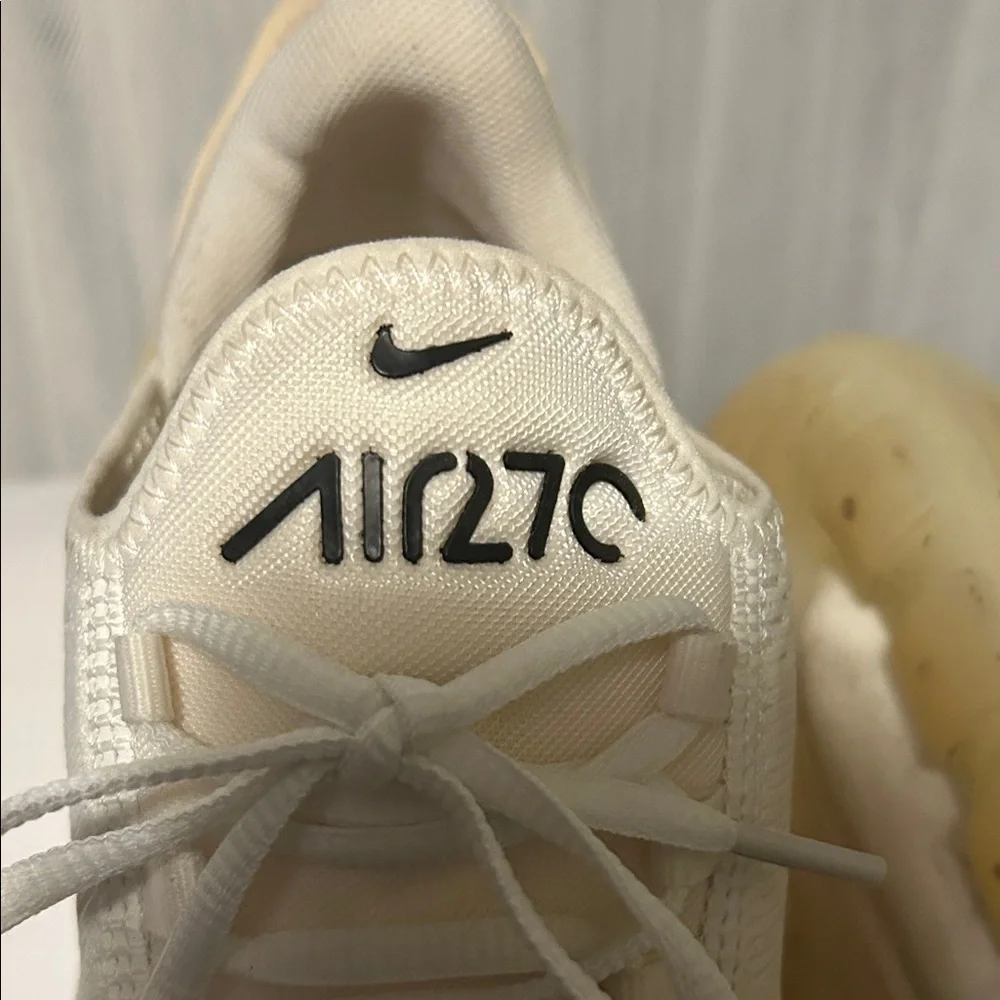 Nike Air 27C White Sneaker.        Size 10. Excellent preowned condition.